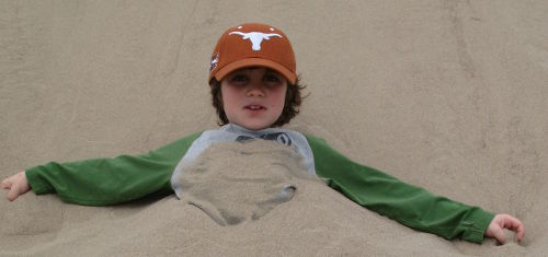 Kid Buried in Sand